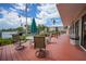 Waterfront deck area with comfortable seating and views of the marina at 25188 Marion Ave # D308, Punta Gorda, FL 33950