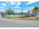 Well-maintained tennis courts surrounded by lush landscaping at 25188 Marion Ave # D308, Punta Gorda, FL 33950