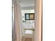 Bright and airy bathroom featuring a shower and a modern vanity with drawers and cabinets at 3415 Gulf Ln, Rotonda West, FL 33947