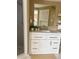Well-lit bathroom showcasing modern vanity with drawers and cabinets, plus a walk-in shower at 3415 Gulf Ln, Rotonda West, FL 33947