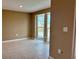 A light-filled living room with tile flooring and view at 3415 Gulf Ln, Rotonda West, FL 33947