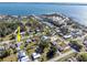 A distant aerial shot shows the property's location near the water at 350 W Cowles St, Englewood, FL 34223