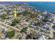 This aerial view highlights the home's location, water access, and proximity to nearby amenities at 350 W Cowles St, Englewood, FL 34223