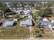 An aerial view of the property featuring a defined property line and surrounding neighborhood at 350 W Cowles St, Englewood, FL 34223