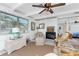 Inviting living room features tile floors, a fireplace, and comfortable seating at 350 W Cowles St, Englewood, FL 34223