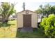 Exterior shot of a shed with a metal door at 350 W Cowles St, Englewood, FL 34223