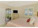 Bright bedroom with lanai access and waterfront views at 4692 Club Dr # 101, Port Charlotte, FL 33953