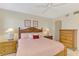 Comfortable bedroom with neutral walls at 4692 Club Dr # 101, Port Charlotte, FL 33953