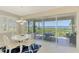 Charming dining area with water views at 4692 Club Dr # 101, Port Charlotte, FL 33953