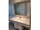 Bathroom featuring retro-style tile, bathtub and sink at 5234 Forbes Ter, Port Charlotte, FL 33981
