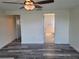 Bright bedroom featuring doorway views to the hallway and bathroom at 5234 Forbes Ter, Port Charlotte, FL 33981