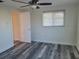 Bedroom features a window and light-colored vinyl flooring at 5234 Forbes Ter, Port Charlotte, FL 33981