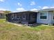 View of the screened lanai, perfect for enjoying the outdoors while protected from insects at 5234 Forbes Ter, Port Charlotte, FL 33981