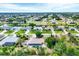 Scenic aerial view of a residential community with waterways and well-maintained homes at 533 Boundary Blvd, Rotonda West, FL 33947