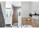 Bathroom with walk-in shower, bathtub and modern fixtures at 533 Boundary Blvd, Rotonda West, FL 33947
