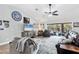 Spacious living room featuring modern furniture, a large television, and an open layout with lots of natural light at 533 Boundary Blvd, Rotonda West, FL 33947