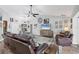 Comfortable living room boasting hardwood floors, stylish furniture, and plenty of natural light streaming through large windows at 533 Boundary Blvd, Rotonda West, FL 33947
