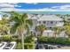 Beautiful condo complex with a waterfront view and lush landscaping in a tropical location at 5856 Gasparilla Rd # Mv26, Boca Grande, FL 33921