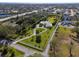Spacious home on a large lot with mature trees and circular drive at 60 N Oxford Dr, Englewood, FL 34223