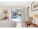 View from bedroom to screened-in pool featuring neutral color palette at 60 N Oxford Dr, Englewood, FL 34223