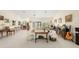 Spacious living room features neutral tones, comfortable seating, and plenty of natural light at 60 N Oxford Dr, Englewood, FL 34223