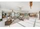 Inviting sunroom filled with natural light, comfortable seating, and a relaxing atmosphere at 60 N Oxford Dr, Englewood, FL 34223