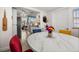Breakfast area with table and view to the kitchen and the living room at 7035 Duke St, Englewood, FL 34224