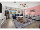 Bright and inviting living room with stylish furnishings and a cozy atmosphere at 7035 Duke St, Englewood, FL 34224