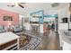 A welcoming living space with a breakfast bar and easy access to the kitchen, ideal for entertaining and modern living at 7035 Duke St, Englewood, FL 34224