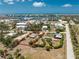 Inviting coastal home on a generous lot, steps from the marina and a vibrant waterfront community, outlined in red at 7035 York St, Englewood, FL 34224