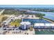 Overhead view of waterfront condos with boat docks and boat parking, offering a coastal living experience at 7070 Placida Rd # 1230, Placida, FL 33946