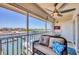 This screened balcony offers stunning waterfront views and includes cozy seating, perfect for relaxation at 7070 Placida Rd # 1230, Placida, FL 33946