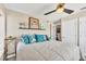 Bedroom featuring coastal decor, soft lighting, and ceiling fan at 7070 Placida Rd # 1230, Placida, FL 33946
