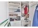 Well-organized walk-in closet with shelves, drawers, and hanging space for storage at 7070 Placida Rd # 1230, Placida, FL 33946