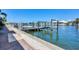 A beautiful view of the marina docks with crystal clear water on a sunny day at 7070 Placida Rd # 1230, Placida, FL 33946