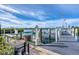 Picturesque marina with docks featuring boat slips on the waterfront of this beautiful community on a sunny day at 7070 Placida Rd # 1230, Placida, FL 33946