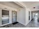 Condo building entrance with a view of a nearby marina; highlighting convenient access and waterfront living at 7070 Placida Rd # 1230, Placida, FL 33946