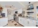 Well-equipped kitchen featuring white cabinets, stainless steel appliances, and granite countertops at 7070 Placida Rd # 1230, Placida, FL 33946