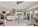 Open concept living and dining area with a view to the outside at 7070 Placida Rd # 1230, Placida, FL 33946