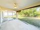 The screened-in patio overlooks the backyard and is perfect for entertaining at 7193 Carvel St, Englewood, FL 34224