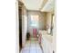 Clean bathroom with a walk-in shower, vanity, and neutral color scheme, creating a relaxing atmosphere at 76 Sportsman Rd, Rotonda West, FL 33947