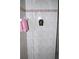 Close-up of a tiled shower featuring a decorative shelf, designed for comfort and convenience at 76 Sportsman Rd, Rotonda West, FL 33947