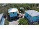 Charming elevated homes surrounded by beautiful trees and landscape at 8152 Little Gasparilla Is, Placida, FL 33946