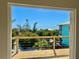 Balcony view showing partial home exterior and view of beach at 8152 Little Gasparilla Is, Placida, FL 33946