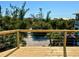 Partial home exterior and view of beach beyond beach foliage at 8152 Little Gasparilla Is, Placida, FL 33946
