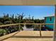 Relaxing outdoor deck featuring beautiful natural surroundings and lots of space at 8152 Little Gasparilla Is, Placida, FL 33946