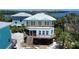 Lovely coastal home on stilts, featuring spacious decks with amazing views at 8152 Little Gasparilla Is, Placida, FL 33946
