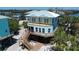 Beautiful coastal house with decks, surrounded by lush tropical landscape at 8152 Little Gasparilla Is, Placida, FL 33946
