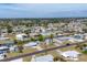 Panoramic aerial view of a neighborhood highlighting a network of canals and waterfront properties at 832 E 4Th St, Englewood, FL 34223