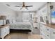 Comfortable bedroom featuring a bed, two dressers, and plenty of natural light at 832 E 4Th St, Englewood, FL 34223